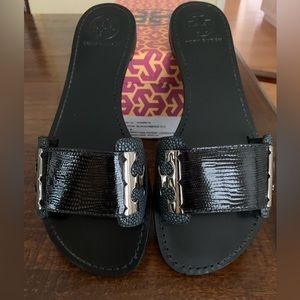 Tory Burch worn one time Gail black/smoke patent lizard slides